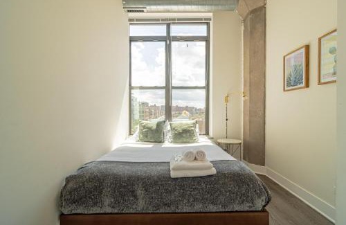 Near South Side Apartment | Bright 2BR Luxury Corner Suite with Optional Parking Sleeps 6 guests Near McCormick Place and Soldier Field
