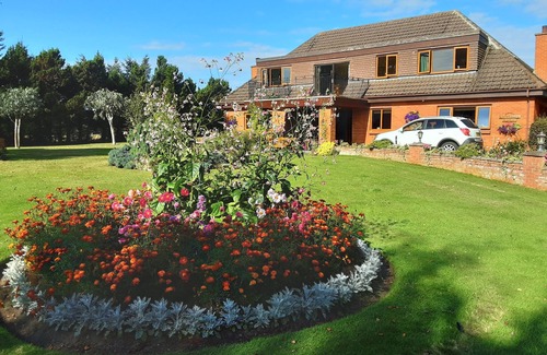 Elgin House | Bright, airy first floor apartment with balcony in rural location