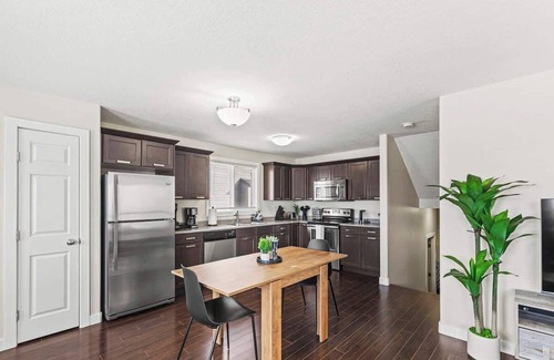 Grande Prairie Apartment | Bright & Airy Suite | Free WIFI | Smart TV & More