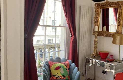 Warwick Apartment | Bright and airy studio apartment with balcony.
