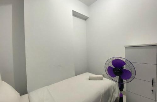 Cibaduyut Apartment | Bright and Relaxing 2BR Apartment at Mekarwangi Square Cibaduyut By Travelio