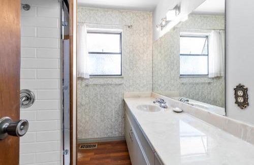 Ladner House | Bright and spacious bedroom with private bathroom