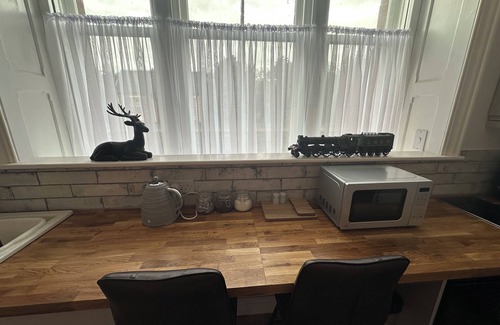 Langwathby Cottage | Bright and spacious 1 bedroom apartment dog friendly & unique with free parking and 22kw EV charger near Lakes One for Instagram!