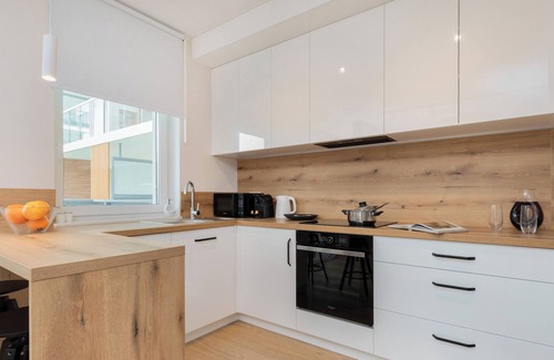 Emaus Apartment | Bright Apartment Gdansk by Renters