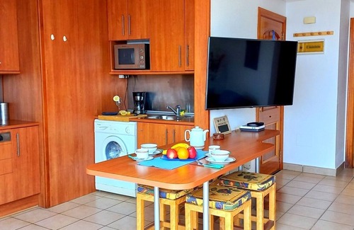 Esquinzo Apartment | Bright apartment with large communal pool