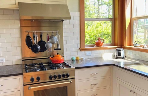 Lopez Island House | Bright art-filled home, fruit trees, valley view