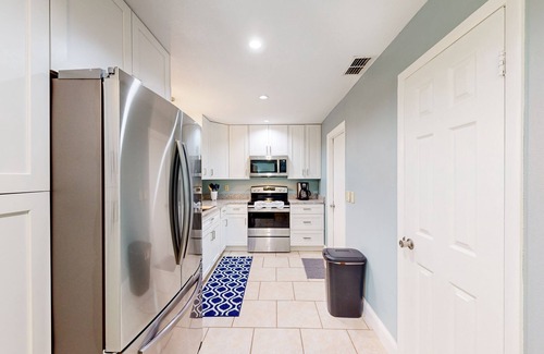 West Melbourne House | Bright dog-friendly house with screened patio - beach & golf nearby