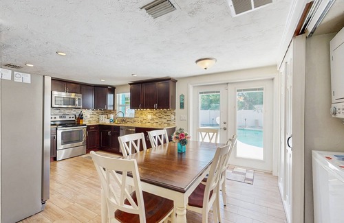 Pinellas Park House | Bright Home with Private Pool, High-Speed WiFi, Firepit, Outdoor Bar, and Grill