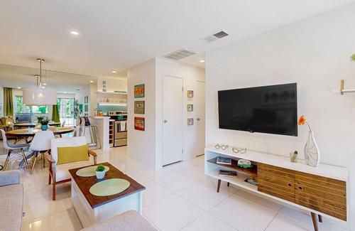 Racquet Club West Condo | Bright & modern dog-friendly oasis with pool, tennis courts, balcony, & A/C