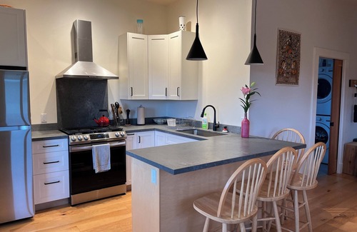 Lopez Island Apartment | Bright one-bedroom in Lopez Village with deck and sunset views