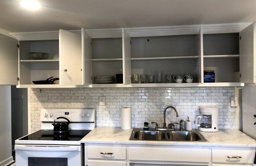 Hickory Apartment | Bright open studio apartment with king bed and queen sofabed. Walk to local shops and restaurants.
