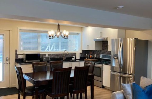 Okanagan-Similkameen Apartment | Bright poolside walkout two bedroom basement suite in the Okanagan