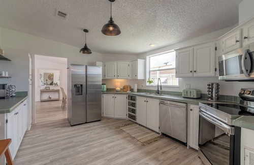 Edgewater House | Bright & Spacious Home with ICW access, two community pools and a boat launch.