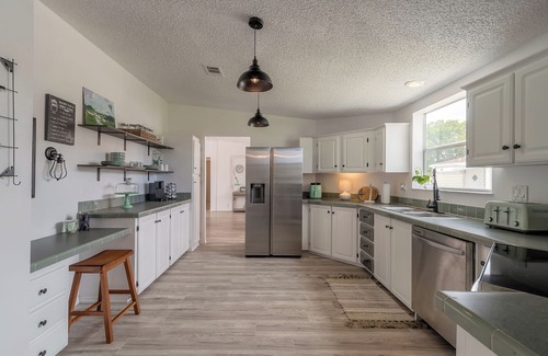 Edgewater House | Bright & Spacious Home with ICW access, two community pools and a boat launch.
