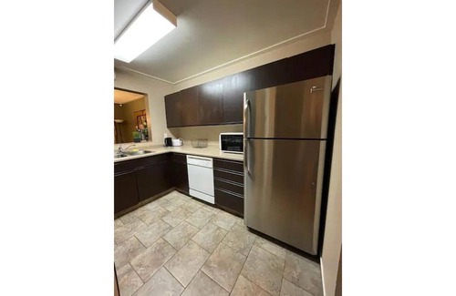 North Central Edmonton Condo | Bright Sunny Top Floor 2 BDR 2 Bath +Den
