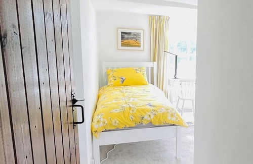 Swindon Cottage | Bright, warm cottage -superb views, private garden