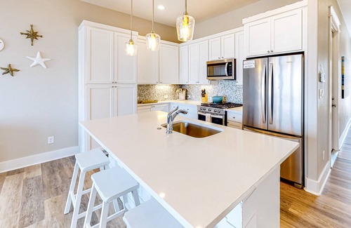 Rockport Villa | Bright waterfront villa with pool, boat slip, patio & balcony in gated community