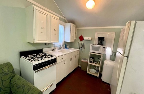 Grawn House | Brookside Cottages and Resort Willow Cottage