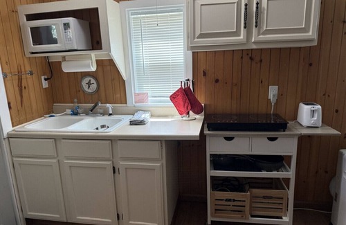 Grawn House | Brookside Cottages and Resort Brookside Cottage