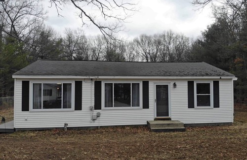 Newaygo House | Brookside Retreat- Charming home with lakes and rivers nearby