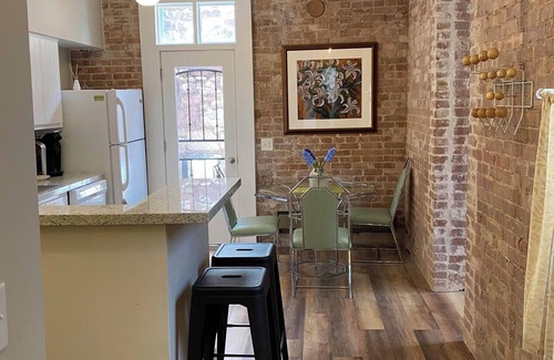 Bisbee House | Brownstone Patio Suite-Historic Building in the Heart of Historic Downtown Bisbee