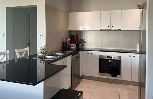 Larrakeyah Apartment | Brushstrokes Hideaway, a Delightful, Modern Tropical Haven in Darwin City