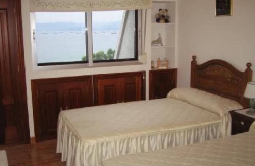 Bueu Apartment | Bueu: Bueu, Rias Baixas, apartment with views in front of Agrelo beach