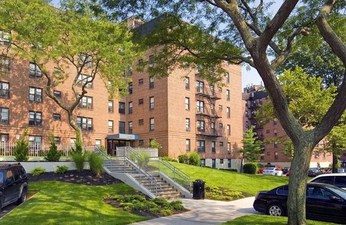 Queens House | Building with fitness room and AC in cool Far Rockaway