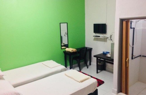 Kampung Lela House | Bunga Raya Guest House BALING