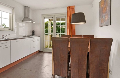 Municipality of Nissewaard House | Bungalow by Water with Sauna in South Holland