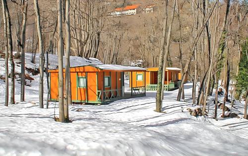 Escaro House | Bungalow confortable à Escaro avec piscine partagée