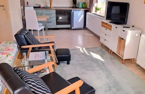 Neukalen House | Bungalow 'Ferienwohnung Naturblick' with Private Terrace, Private Garden and Wi-Fi