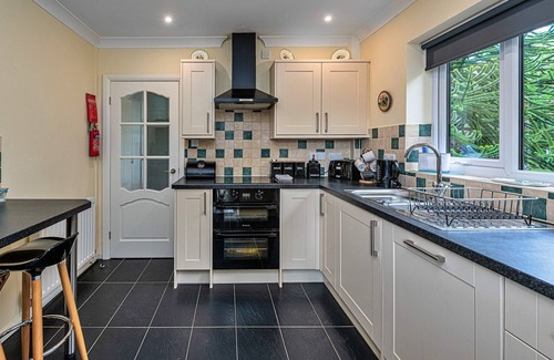 Dyserth Cottage | Bungalow in Dyserth with Hot Tub & Waterfall