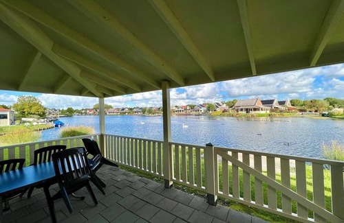 Municipality of Nissewaard House | Bungalow in Holland by Water with Sauna