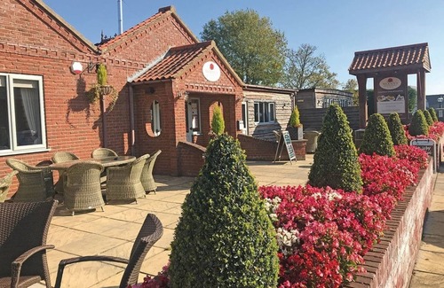 Alford House | Bungalow with two doubles (twins by arrangement) and one single cabin bed.
