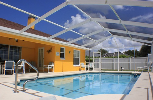 Inverness House | Bursting with Sunshine Pool Home S & G by RedAwning