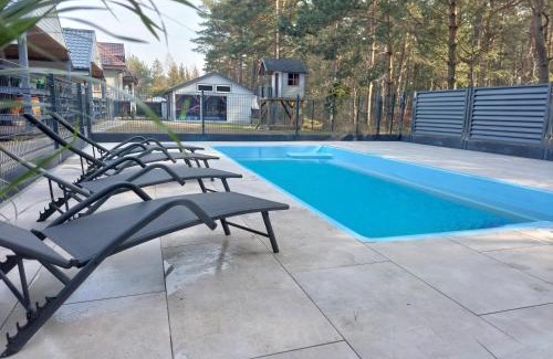 Ostrowo House | Bursztynowo Domki z basenem
