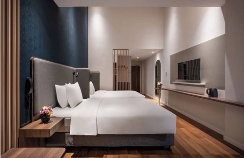 Pudong Hotel | Button Wood Hotel