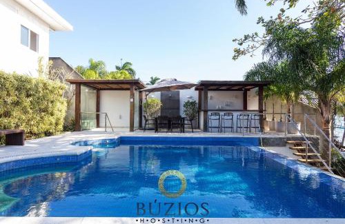 Humaita House | Bz48 Condomínio frente a Orla Bardot!Casa 4 suítes