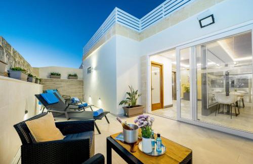 Ggantija House | C4 Retreats by Georges Boutique Living