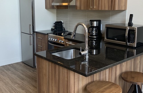 Sainte-Marguerite-du-Lac-Masson Condo | Top floor 2 bedroom Condo with Lake View