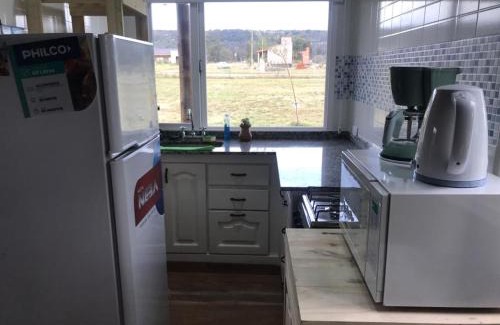 Balcarce Ski Chalet | cabaña vista a la sierra