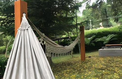 Bairro Lago Negro House | Cabana Alemã Rustica com pátio