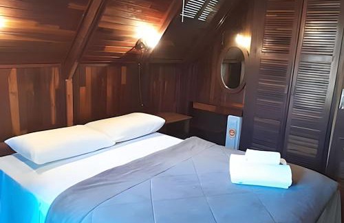 Bairro Lago Negro House | Cabana Alemã Rustica com pátio