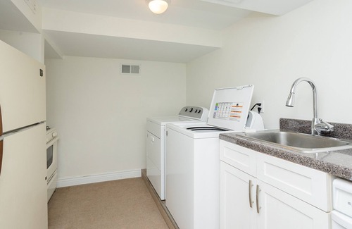 Michigan City House | Cabana style vacation home, w/HOT TUB & easy stroll to beach, sleeps 16.