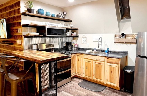 Glenwood Springs Cabin | Cabin 12 Remodeled Rustic Luxury Kitchen Fireplace
