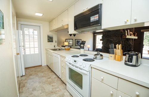 Overlook Park House | Cabin Feel, A Cozy Stone-Faced, double sided Fireplace! - Landrise 7
