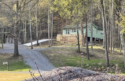 Guntersville Cottage | Cabin mountain side deck and privacy. Boat parking with electric and water.
