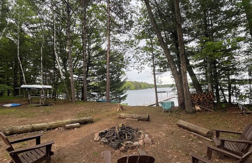 Stone Lake Cabin | Cabin on sandy lakefront with gentle slope to the lake