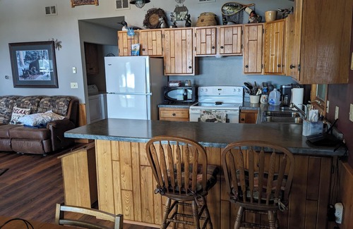 Phillips Cabin | Cabin on Soo Lake. Enjoy the views of the lake 66' from water's edge.